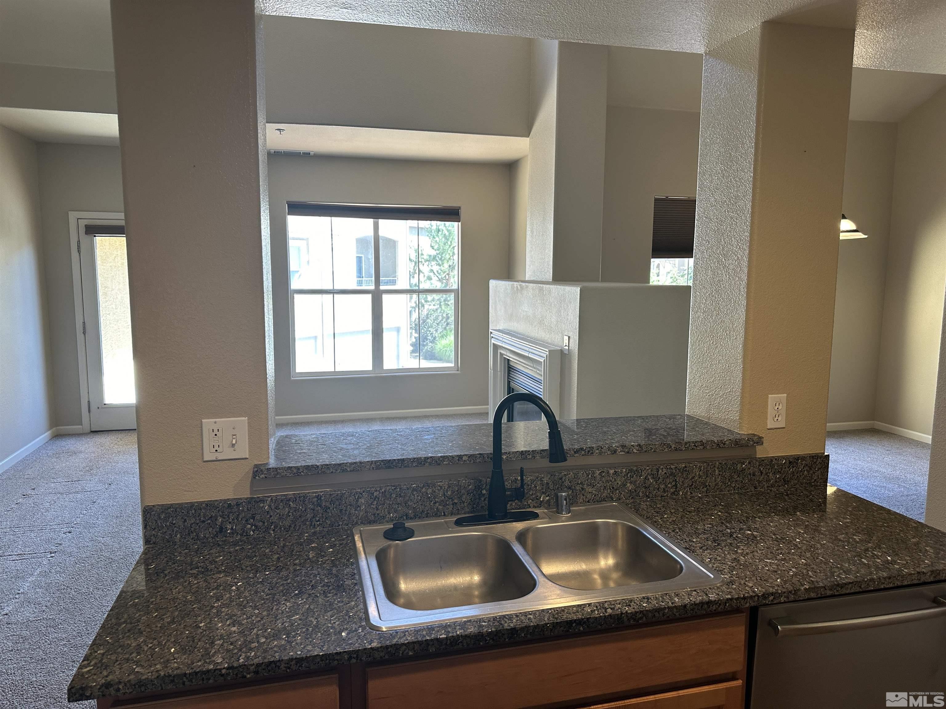 9050 Double R Boulevard, Unit 422 Reno, NV 89521 - Photo 11 of 33 a close view of sink and tap