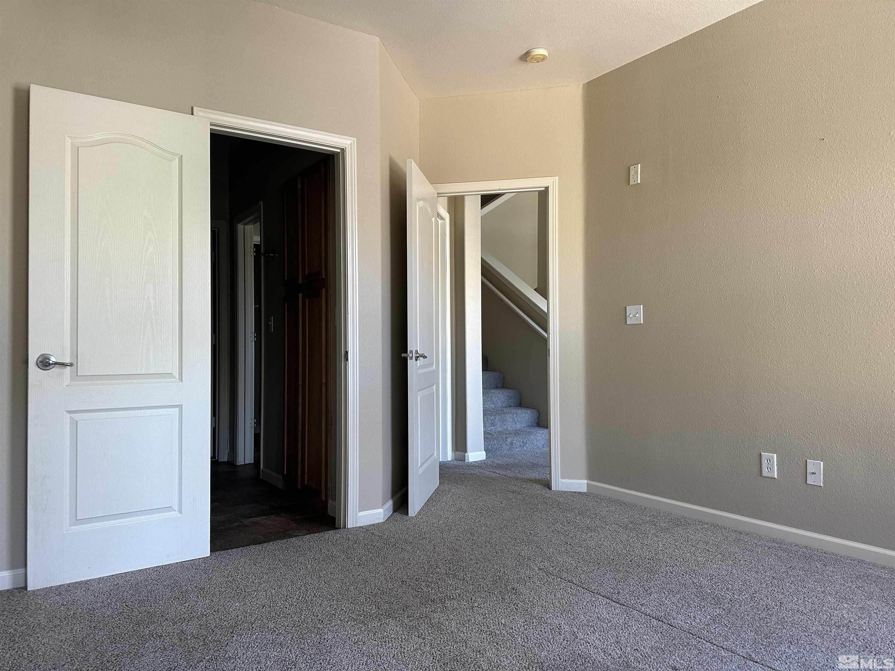 9050 Double R Boulevard, Unit 422 Reno, NV 89521 - Photo 14 of 33 a view of a hallway with bathroom