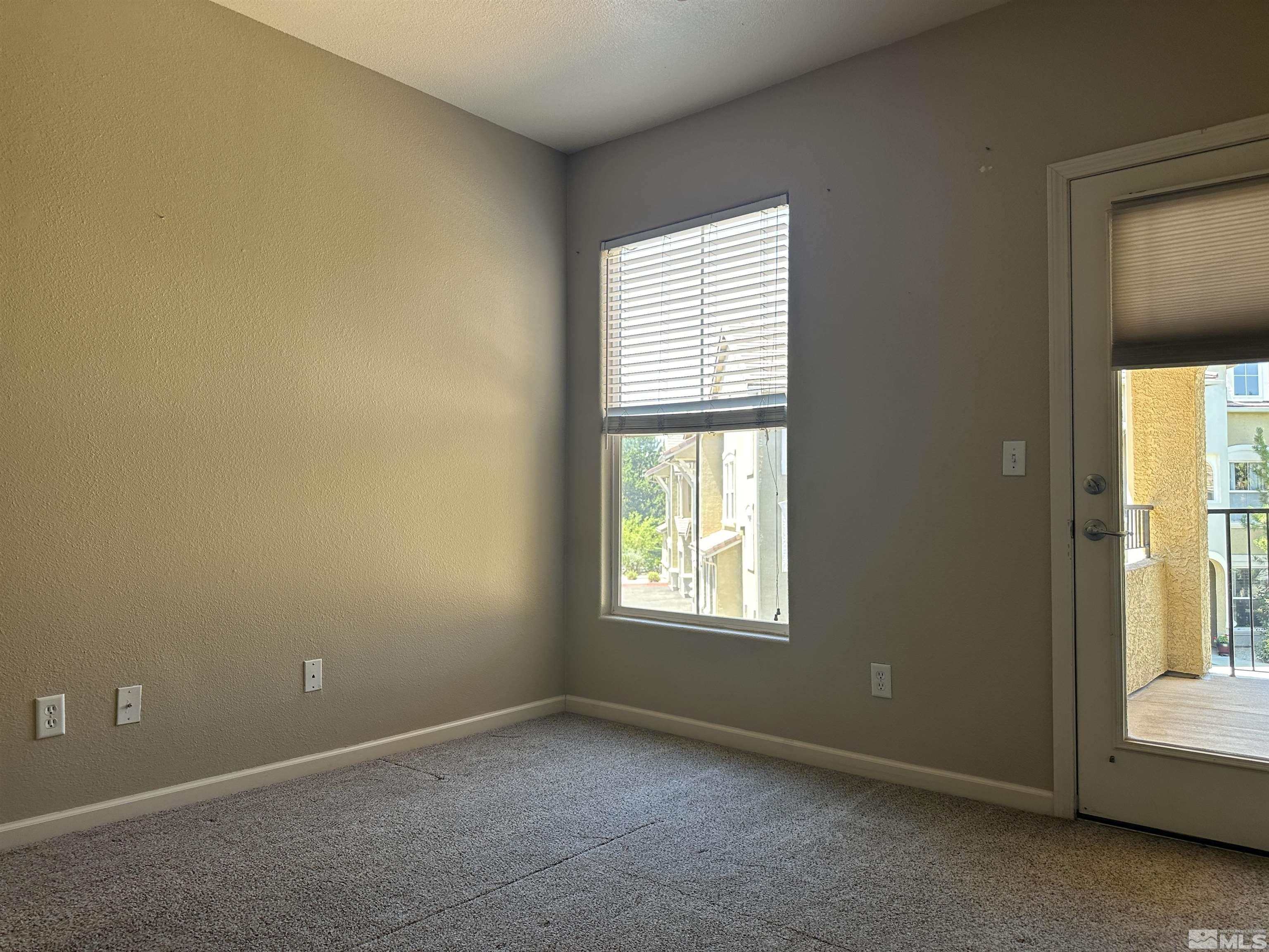 9050 Double R Boulevard, Unit 422 Reno, NV 89521 - Photo 15 of 33 an empty room with a window