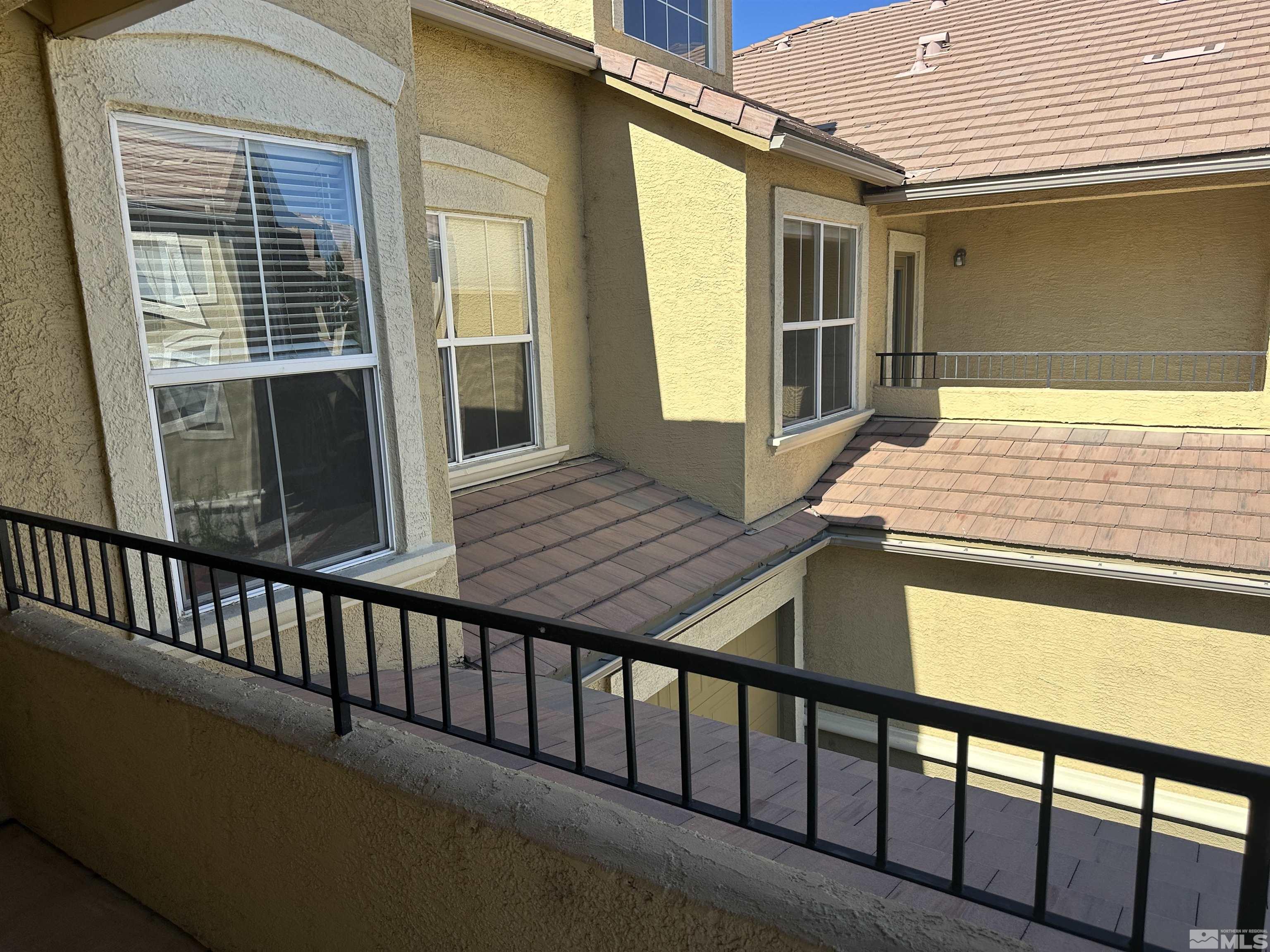9050 Double R Boulevard, Unit 422 Reno, NV 89521 - Photo 16 of 33 a balcony view with a outdoor seating space