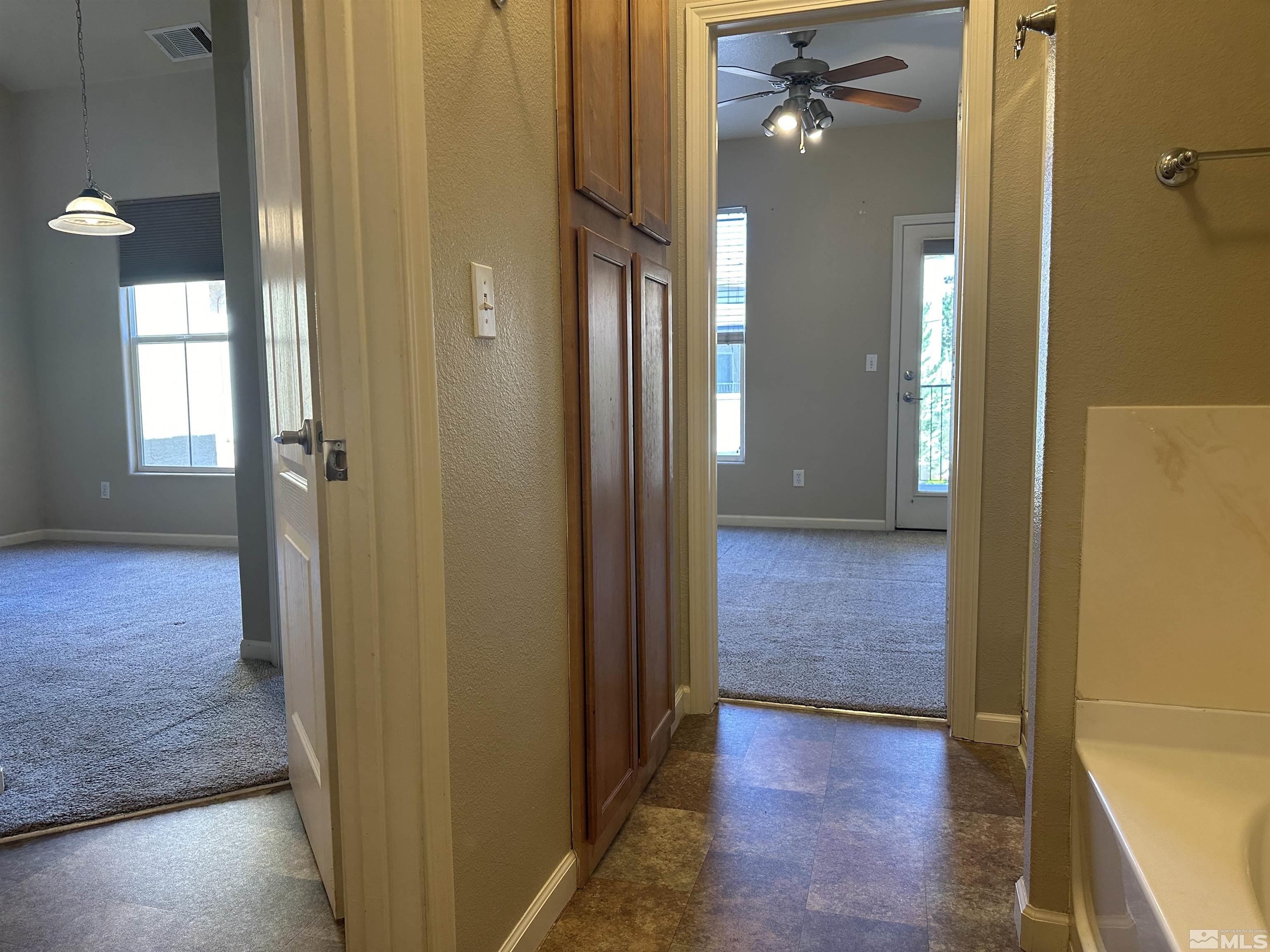 9050 Double R Boulevard, Unit 422 Reno, NV 89521 - Photo 19 of 33 wooden floor in a gallery