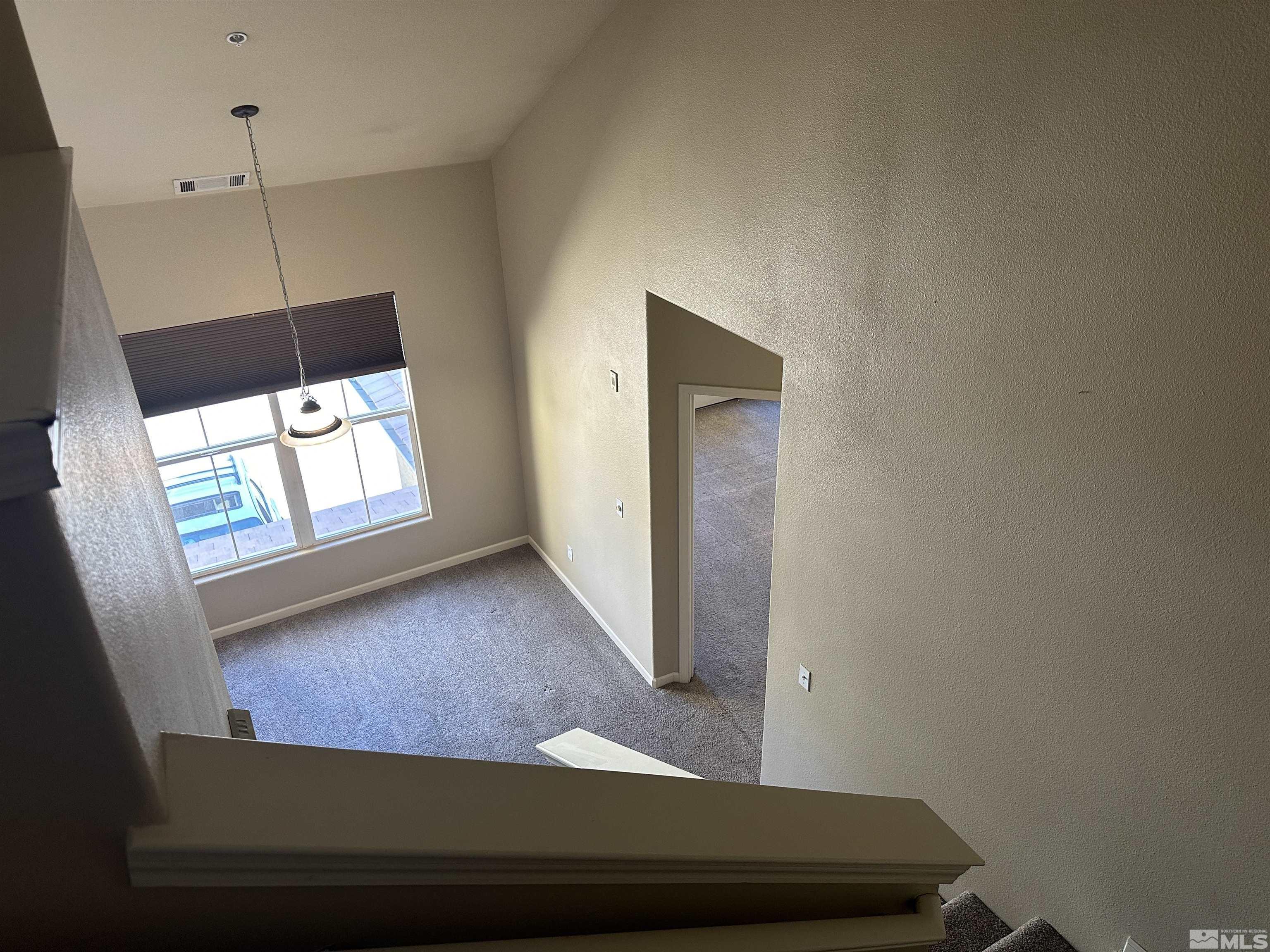 9050 Double R Boulevard, Unit 422 Reno, NV 89521 - Photo 23 of 33 a view of a hallway with front door