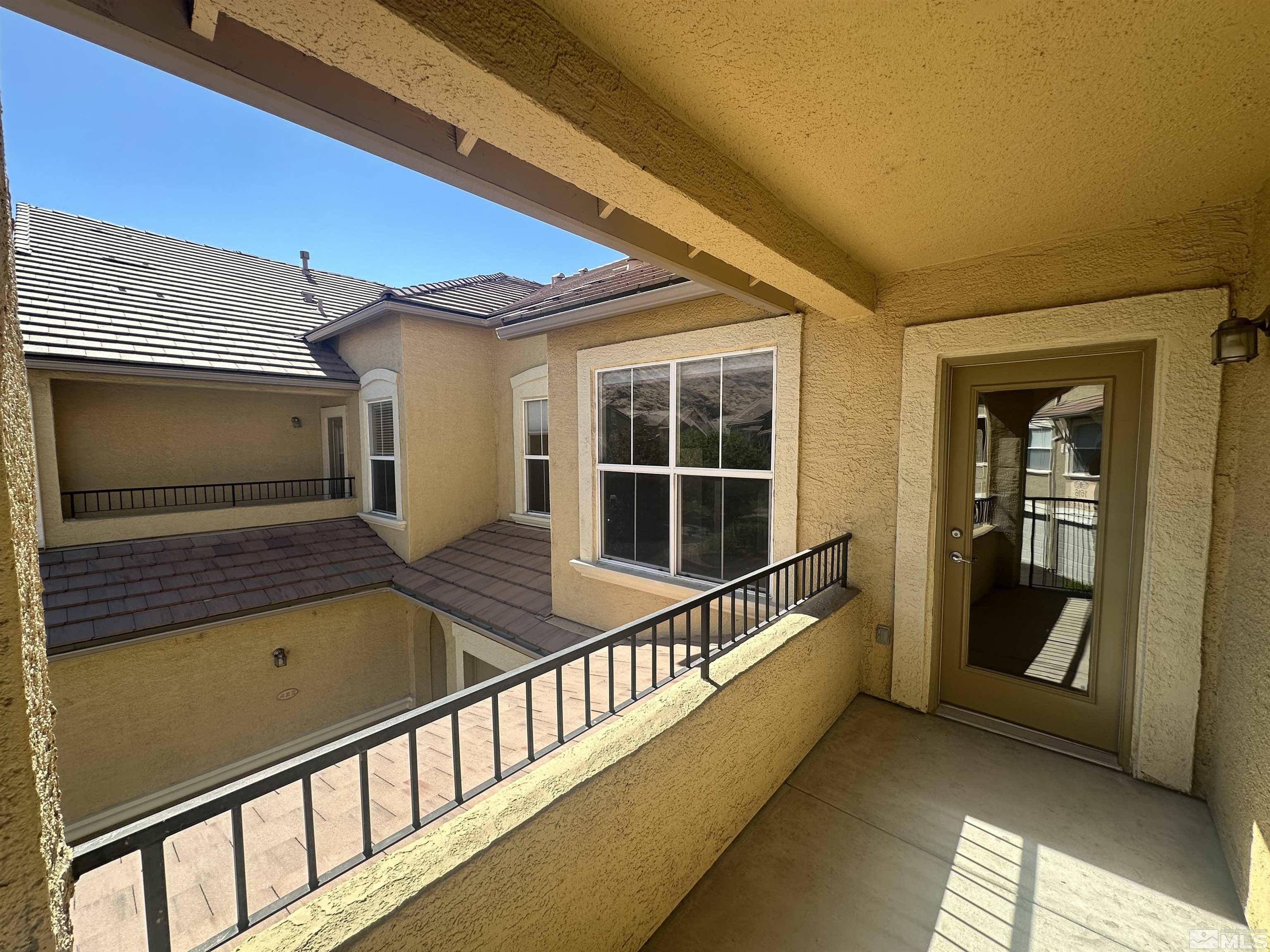 9050 Double R Boulevard, Unit 422 Reno, NV 89521 - Photo 26 of 33 a view of a car park with a large window
