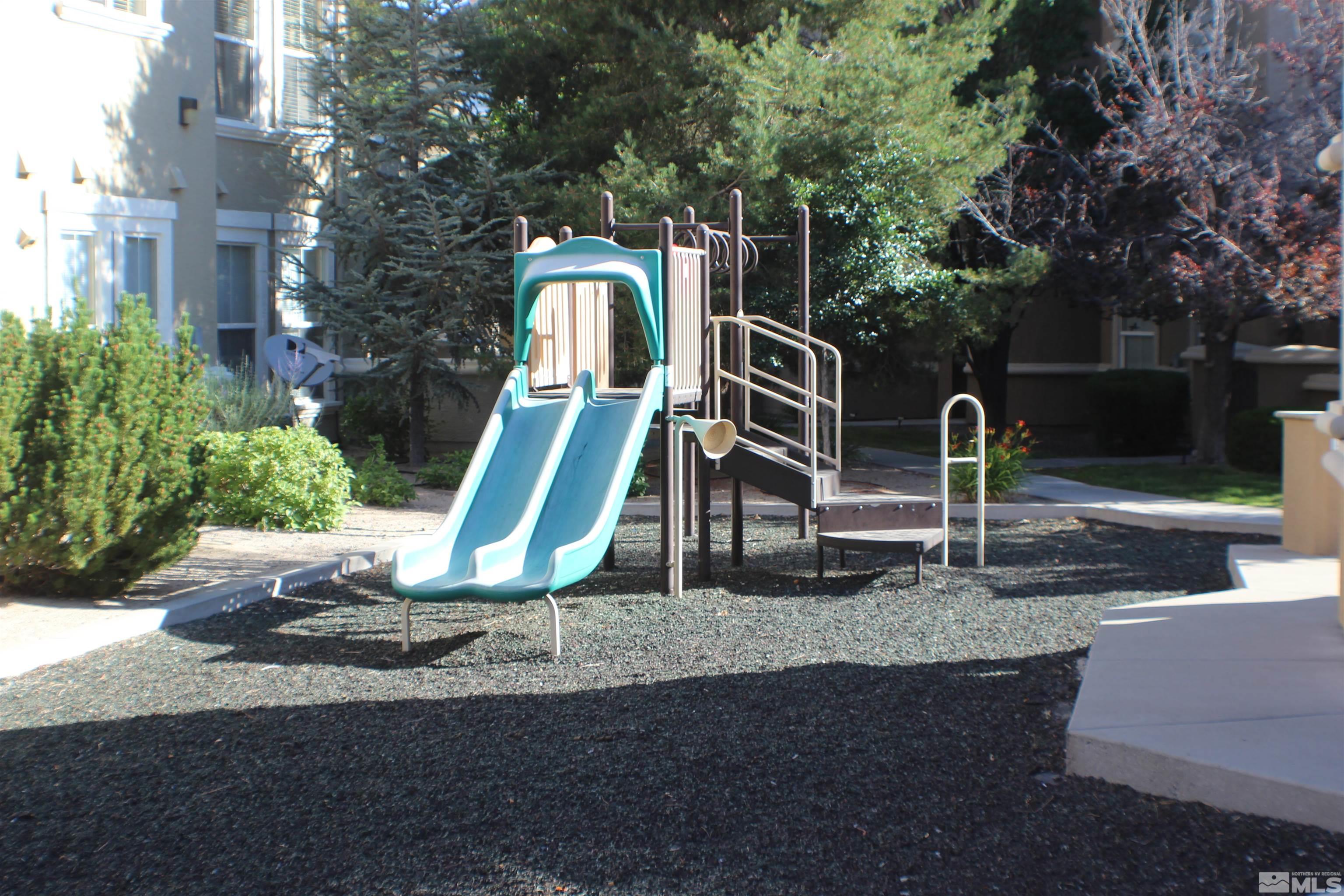 9050 Double R Boulevard, Unit 422 Reno, NV 89521 - Photo 31 of 33 a view of a park with slide