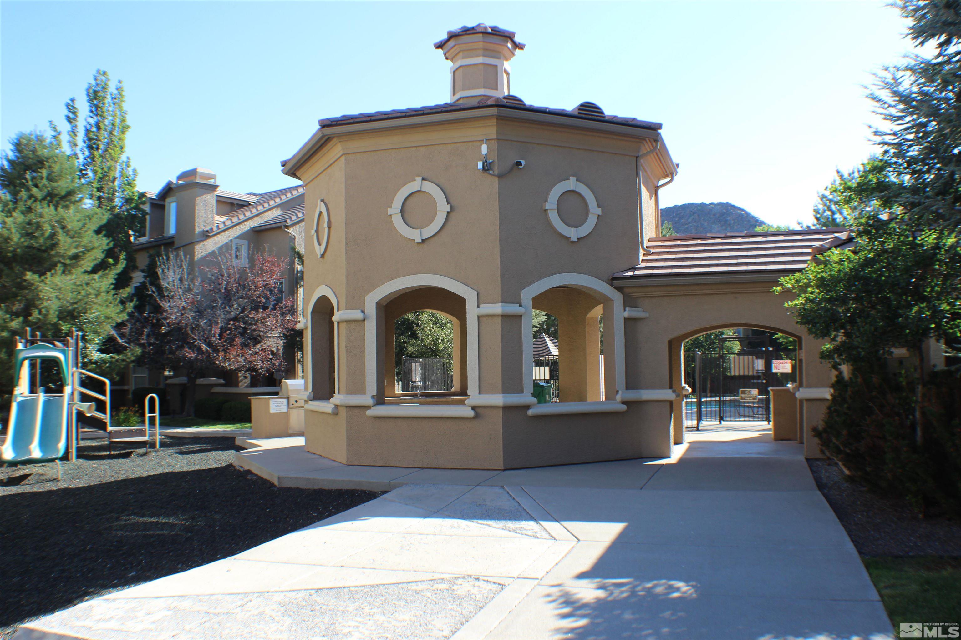 9050 Double R Boulevard, Unit 422 Reno, NV 89521 - Photo 33 of 33 a front view of house with yard