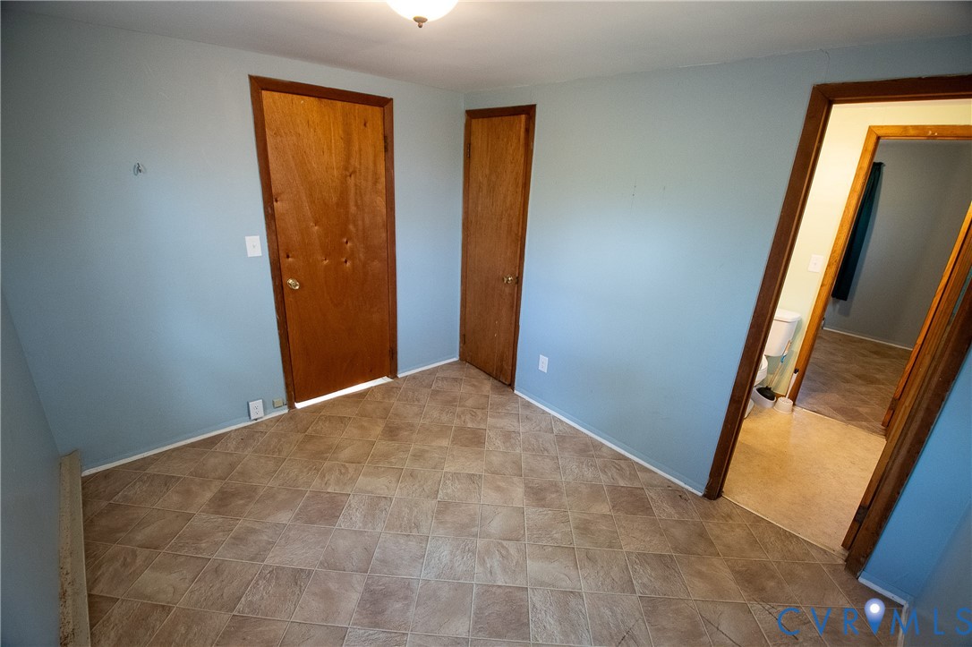 11750 Bevils Bridge Road Amelia Court House, VA 23002 - Photo 15 of 15 Unfurnished bedroom with baseboards