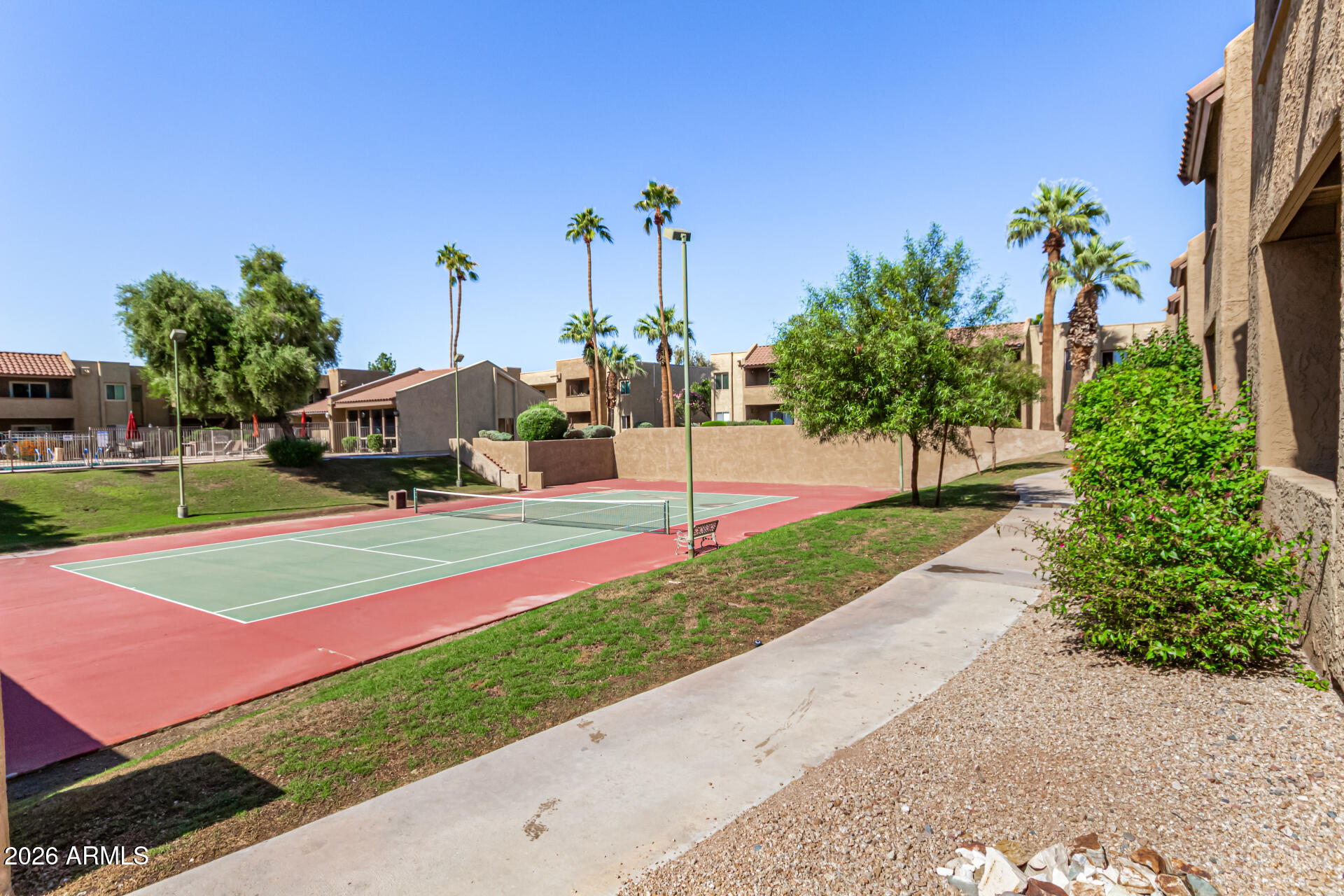 5877 North Granite Reef Road, Unit 1133 Scottsdale, AZ 85250 - Photo 2 of 33 a park with lots of potted plants