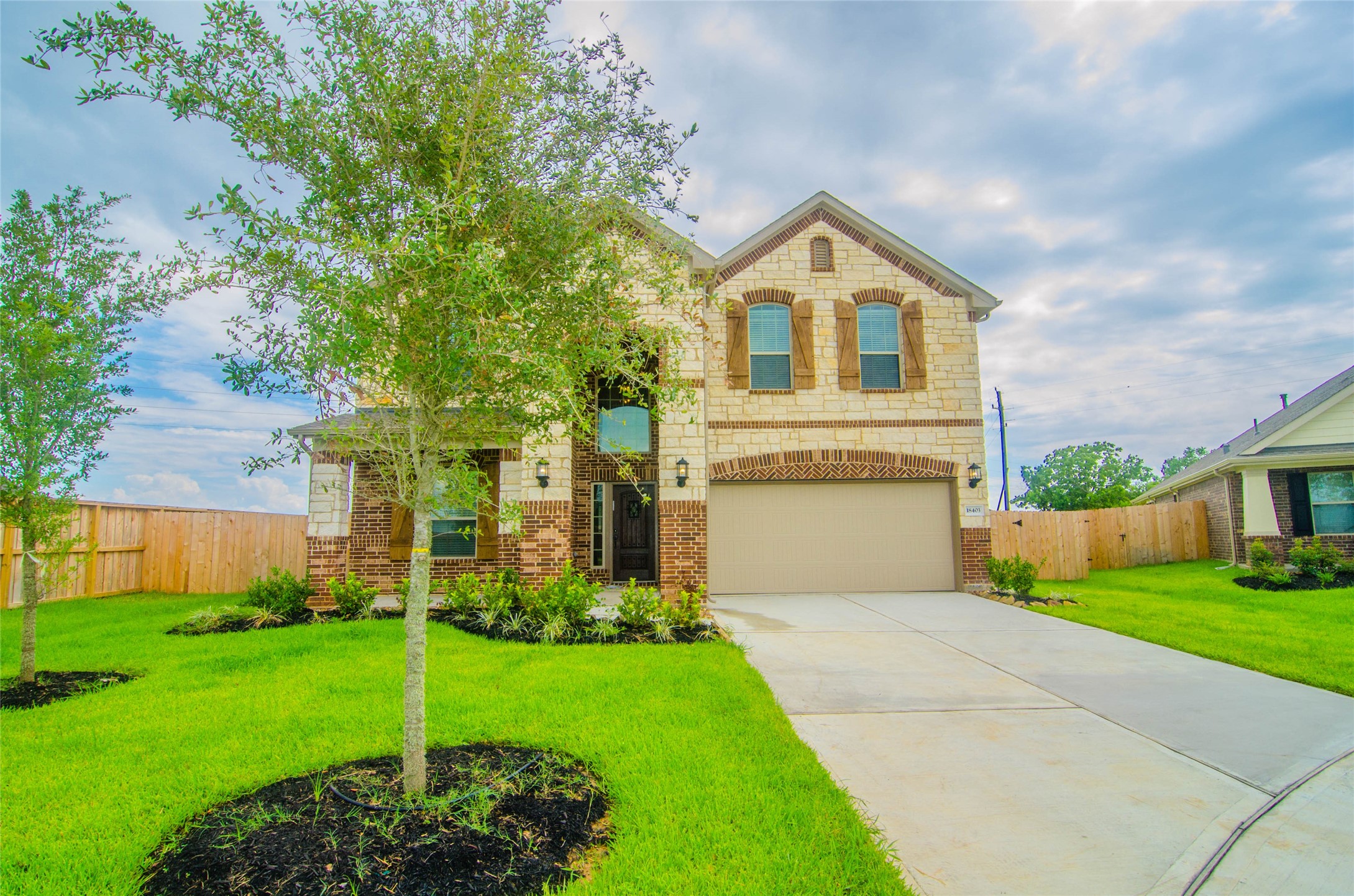 18403 Weeping Spring Drive Cypress, TX 77429 - Photo 2 of 25 a view of house with backyard and garden