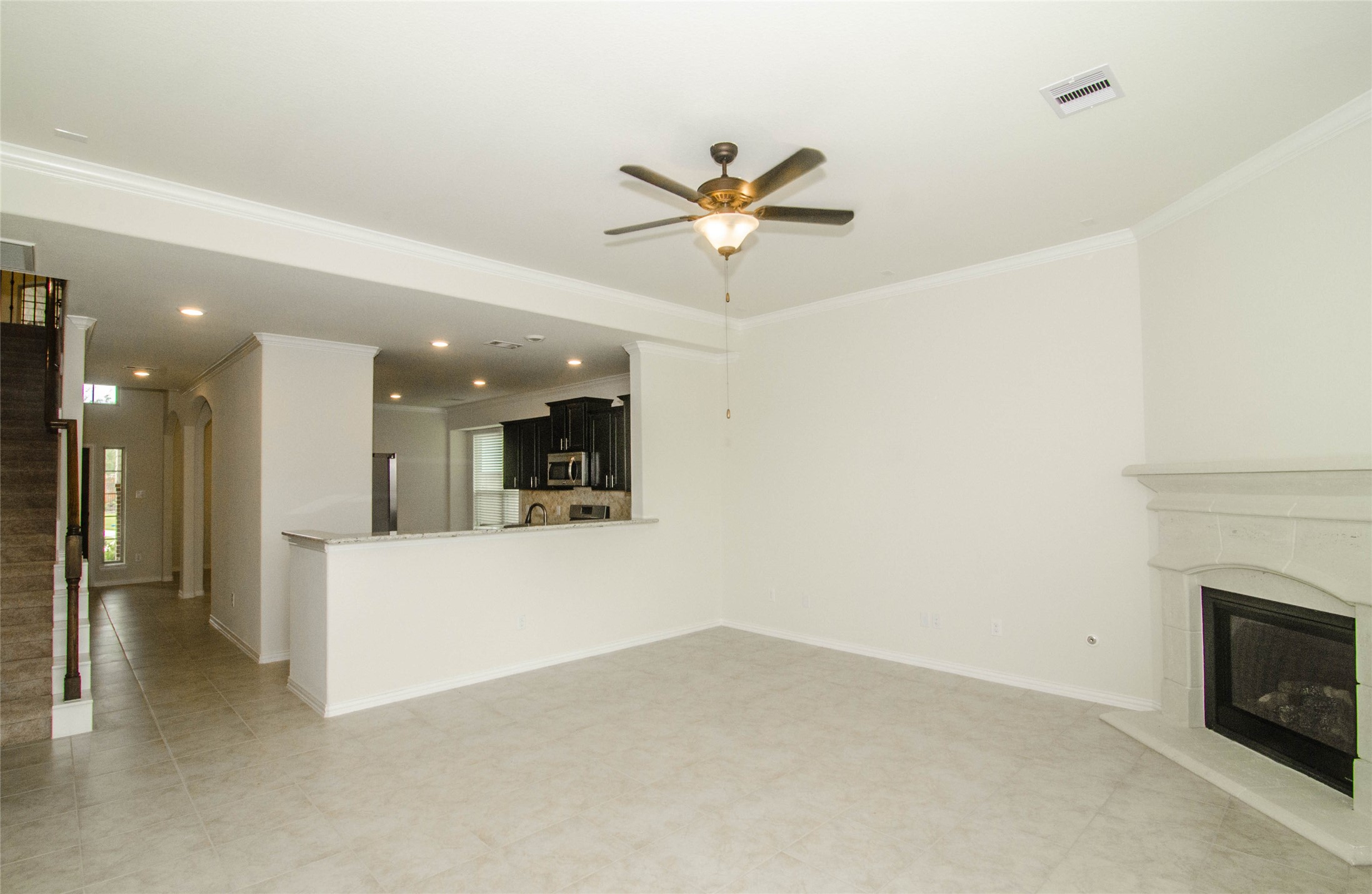 18403 Weeping Spring Drive Cypress, TX 77429 - Photo 10 of 25 a view of a livingroom with a fireplace