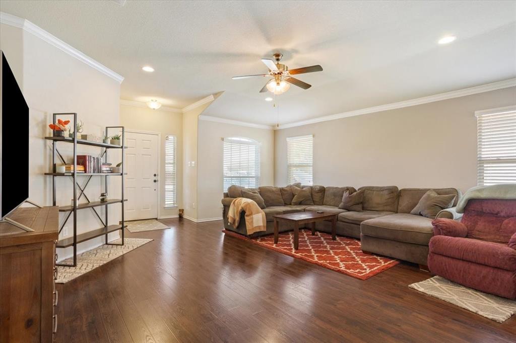 5308 Tama Drive Waco, TX 76708 - Photo 5 of 29 a living room with furniture a ceiling fan and a window