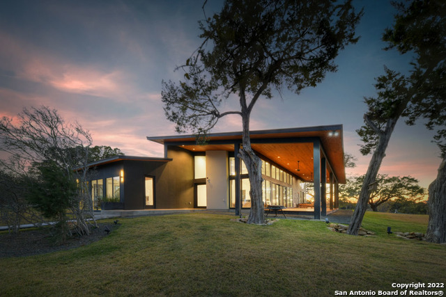 417 Southwick Ranch Johnson City, TX 78636 - Photo 2 of 45 front view of house with a yard