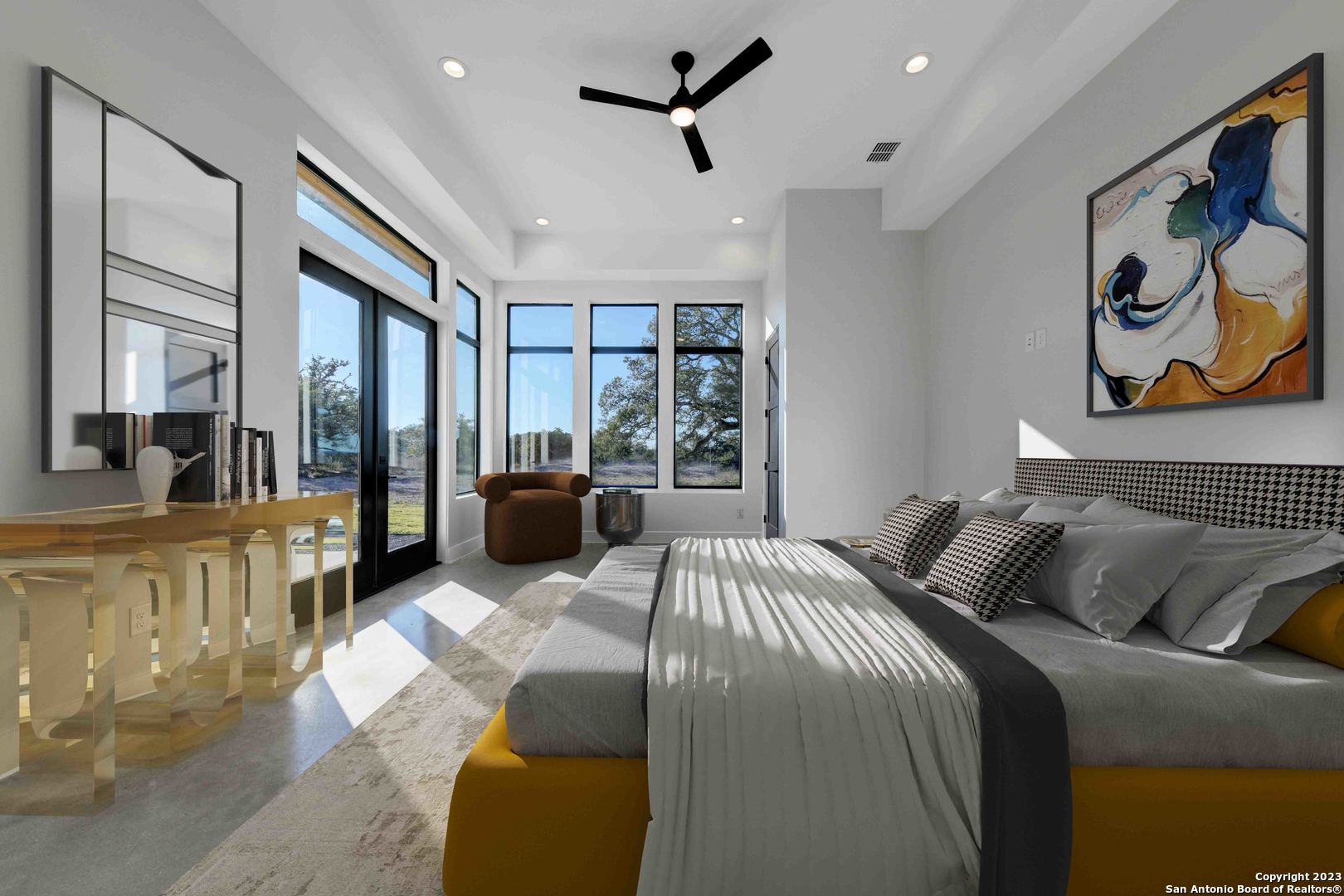 417 Southwick Ranch Johnson City, TX 78636 - Photo 25 of 45 a bedroom with a large bed couch and a large window