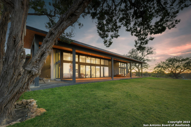 417 Southwick Ranch Johnson City, TX 78636 - Photo 35 of 45 a garden view with a seating space