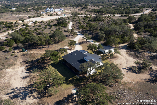417 Southwick Ranch Johnson City, TX 78636 - Photo 42 of 45 an aerial view of residential houses with outdoor space