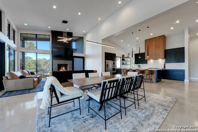 417 Southwick Ranch Johnson City, TX 78636 - Photo 8 of 45 a living room with furniture and kitchen view