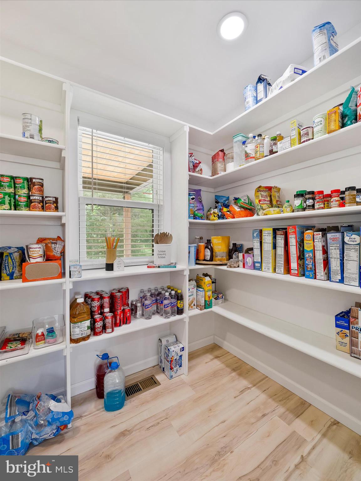 2144 Hinton Road Kearneysville, WV 25430 - Photo 19 of 45 walk-in pantry w/ natural light and full shelving