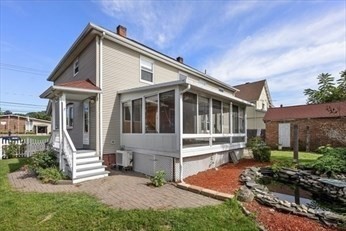 356 East Street, Unit 356 Ludlow, MA 01056 - Photo 12 of 12 a front view of a house with a yard