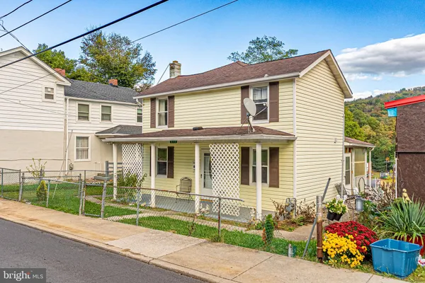 a view of a house with a garden