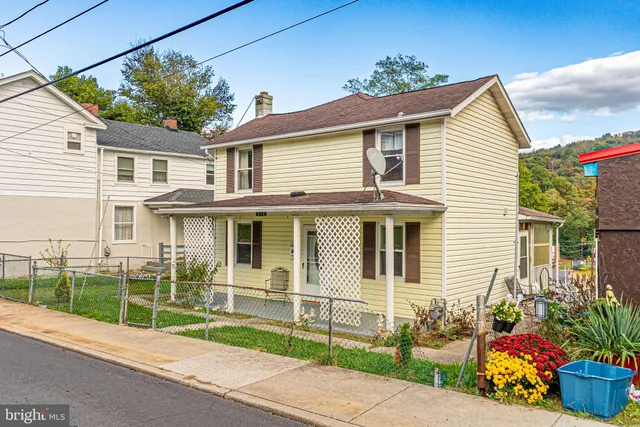 a view of a house with a garden
