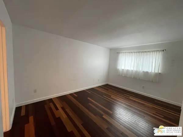 a bathroom with a bath tub a sink and a toilet