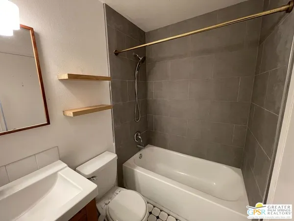 a bathroom with a sink and a toilet