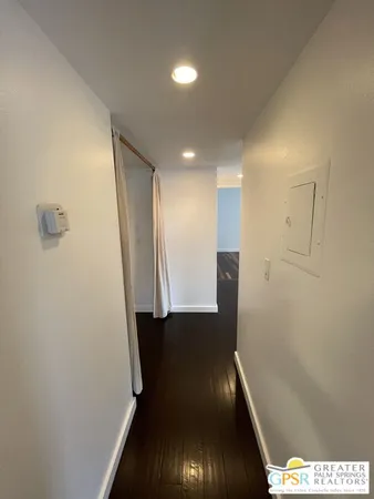 a view of hallway with chair