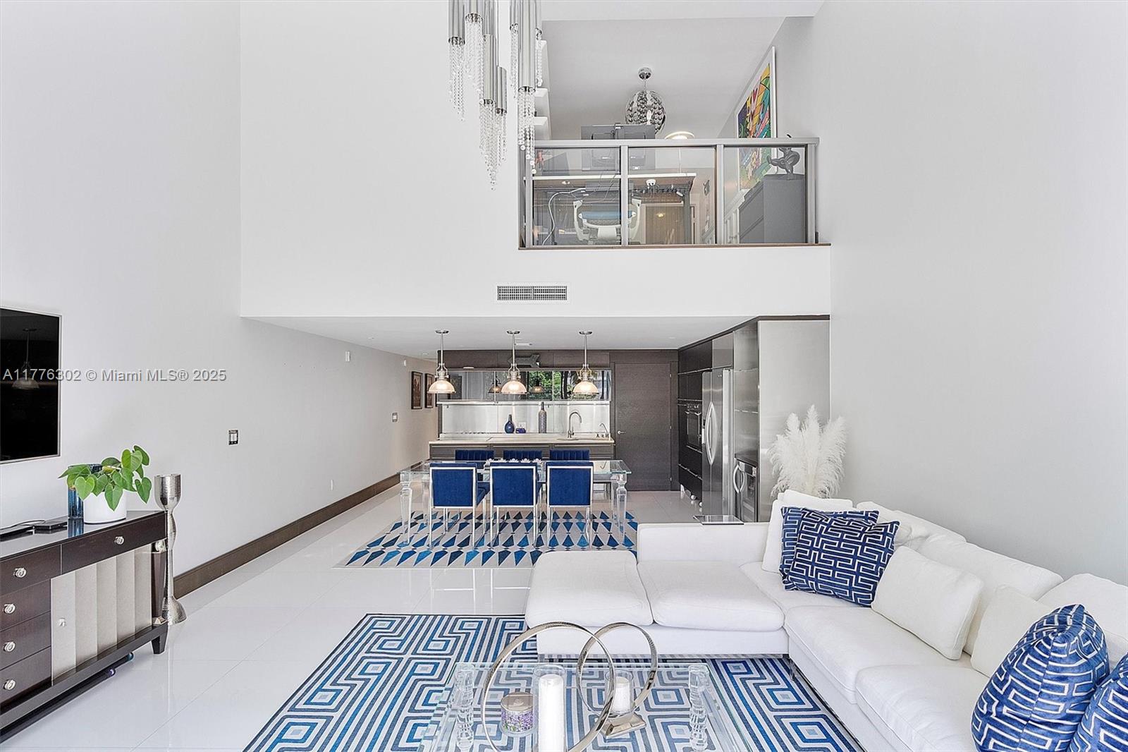 6000 Collins Avenue, Unit 326 Miami Beach, FL 33140 - Photo 12 of 45 a living room with furniture