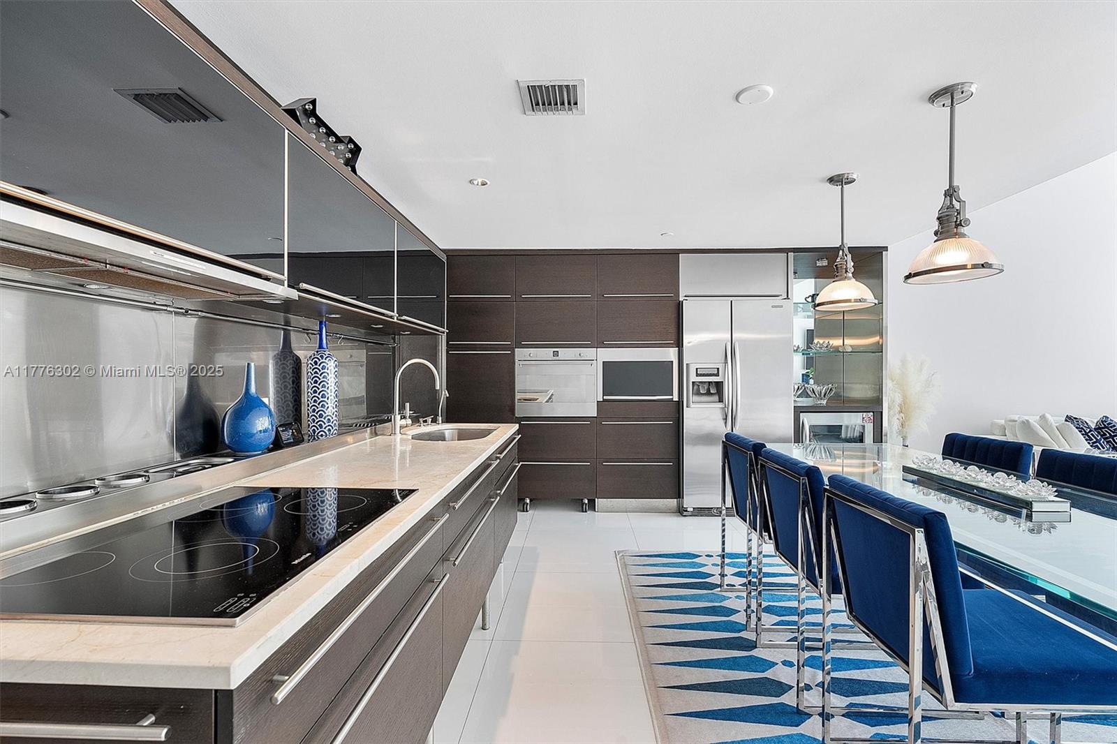 6000 Collins Avenue, Unit 326 Miami Beach, FL 33140 - Photo 17 of 45 a kitchen with lots of counter top space