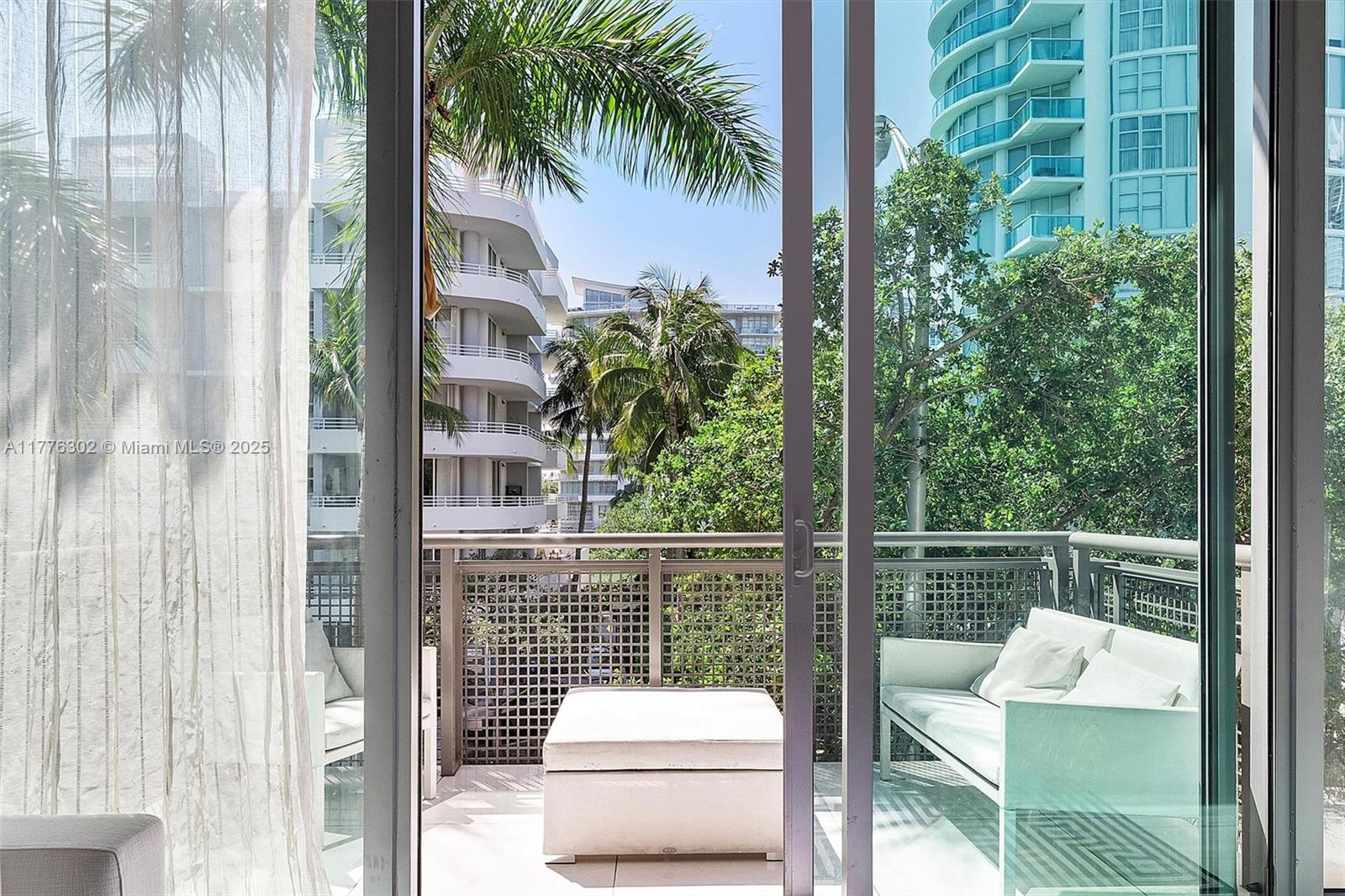 6000 Collins Avenue, Unit 326 Miami Beach, FL 33140 - Photo 19 of 45 a view of balcony with couch