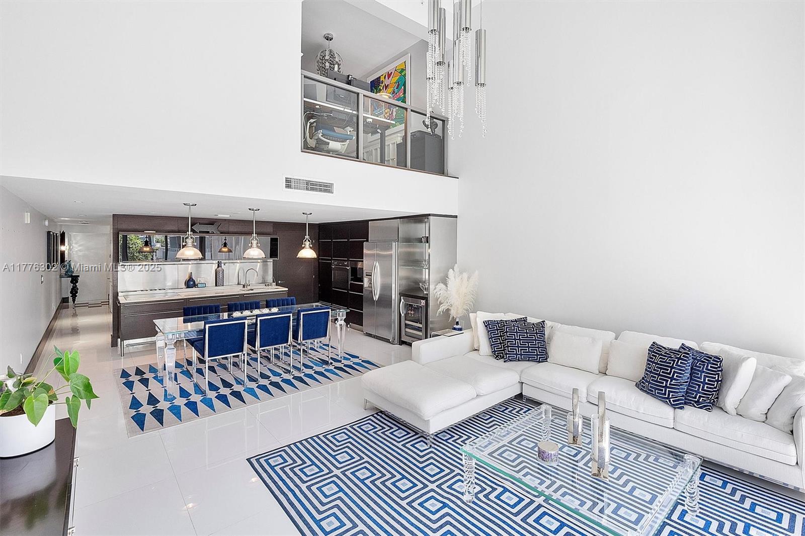 6000 Collins Avenue, Unit 326 Miami Beach, FL 33140 - Photo 4 of 45 a living room with furniture and a rug