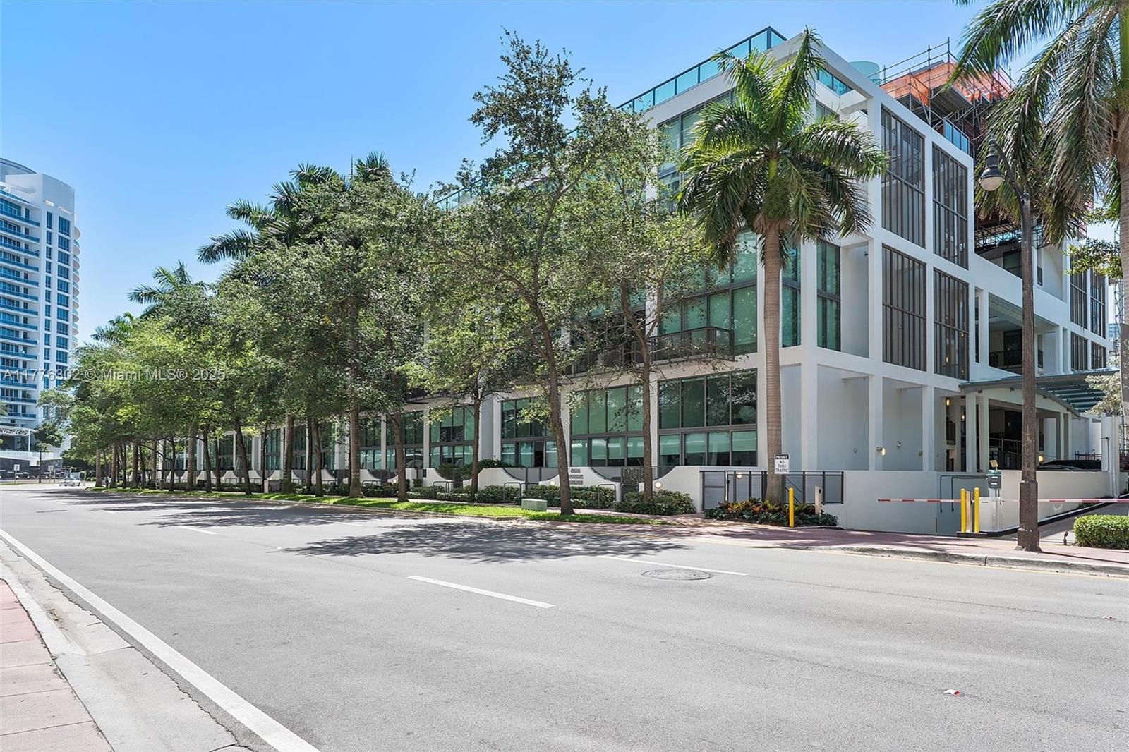 6000 Collins Avenue, Unit 326 Miami Beach, FL 33140 - Photo 41 of 45 a street view of a building with a street