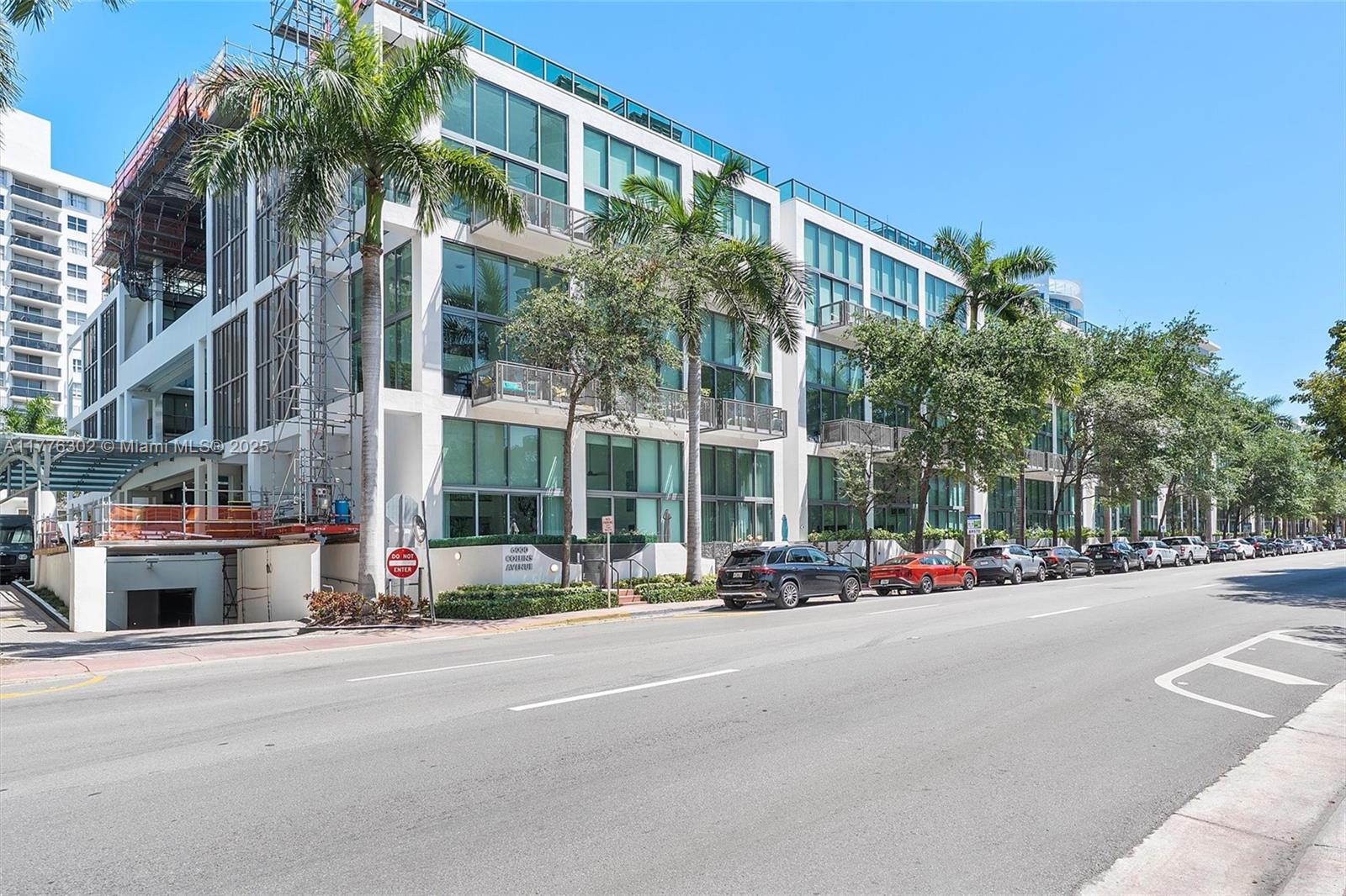 6000 Collins Avenue, Unit 326 Miami Beach, FL 33140 - Photo 42 of 45 a view of a street with cars on the road