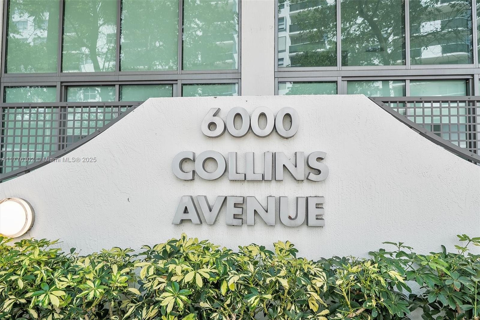 6000 Collins Avenue, Unit 326 Miami Beach, FL 33140 - Photo 43 of 45 a view of outdoor space with sign board