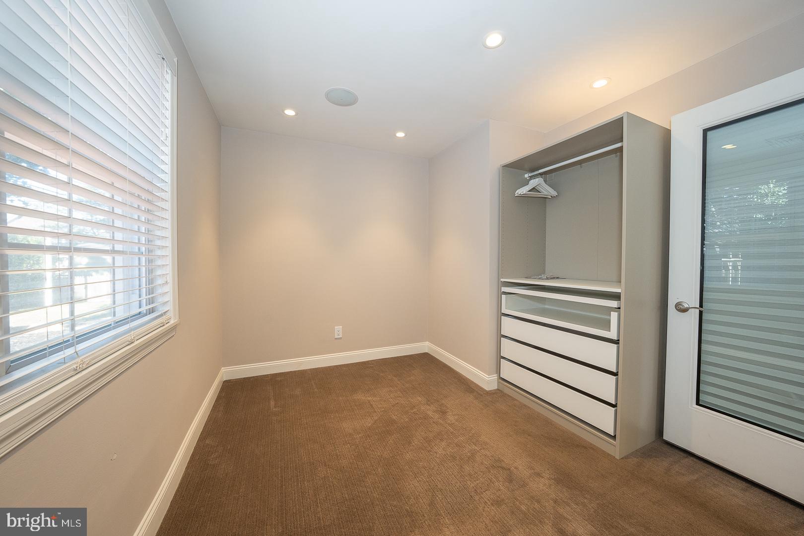 226 East Springfield Road Springfield, PA 19064 - Photo 48 of 75 a view of wooden floor and windows in a room