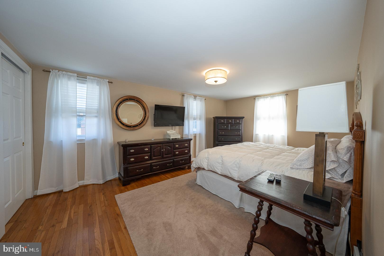 226 East Springfield Road Springfield, PA 19064 - Photo 54 of 75 a bed room with a bed window and a mirror