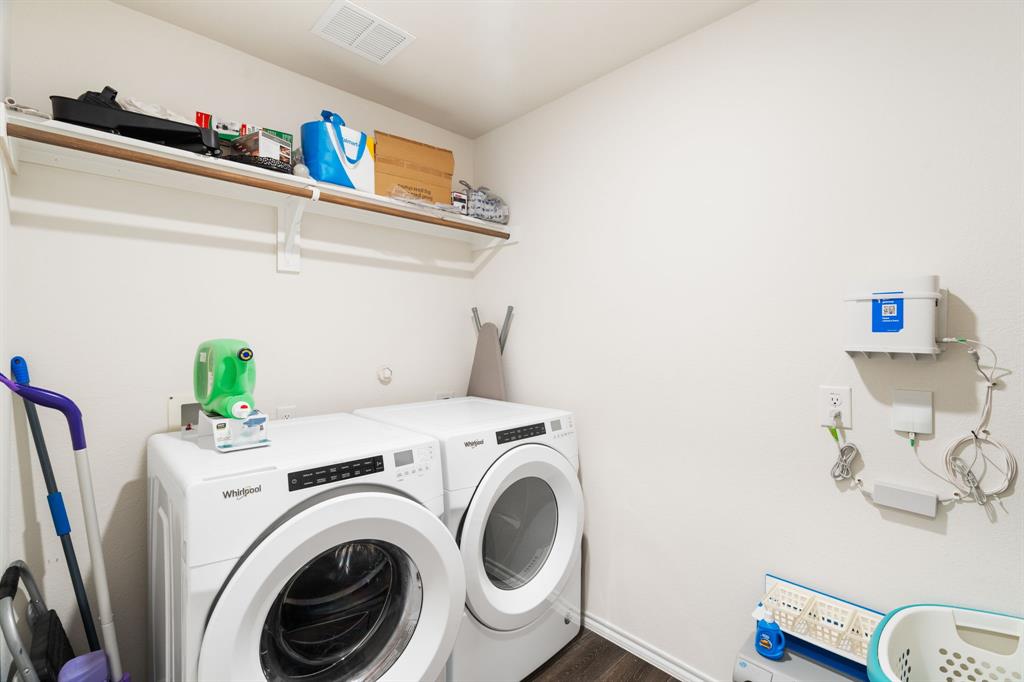 3413 Perman Drive Forney, TX 75126 - Photo 24 of 33 a utility room with dryer and washer