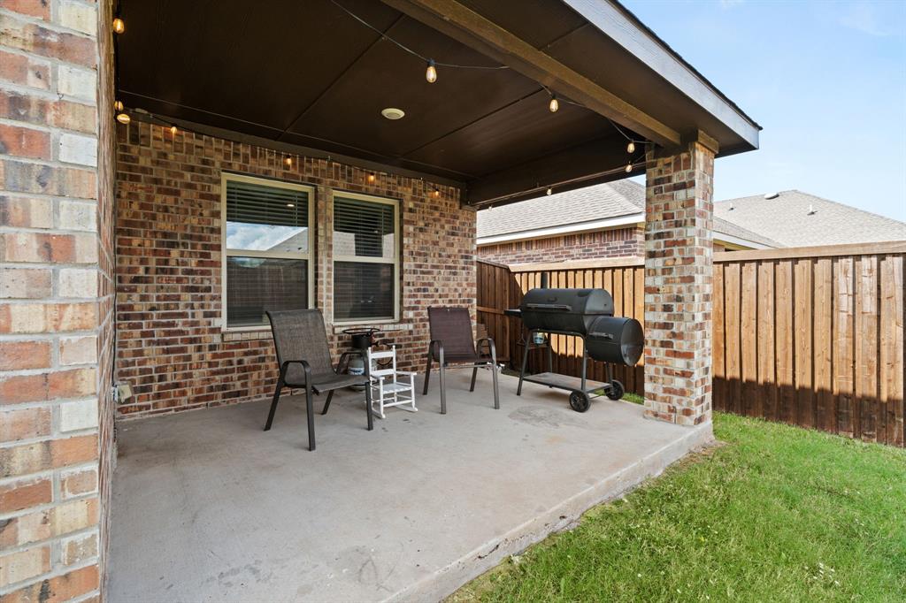 3413 Perman Drive Forney, TX 75126 - Photo 25 of 33 a patio with table and chairs