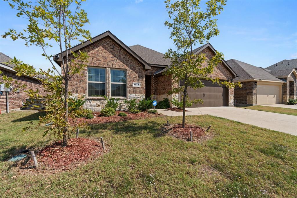 3413 Perman Drive Forney, TX 75126 - Photo 30 of 33 a backyard of a house with table and chairs