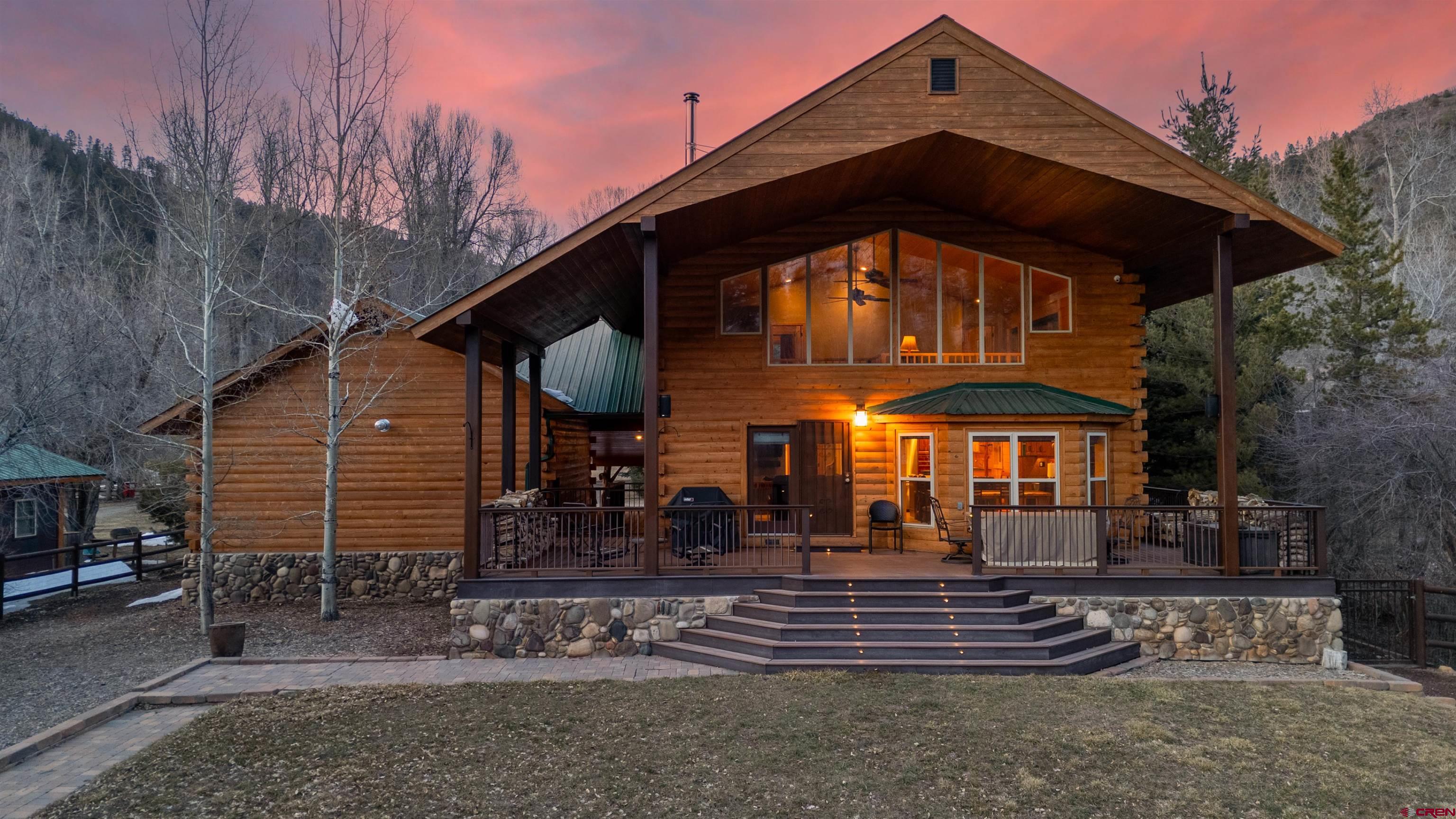 25112 Road 38.1 Dolores, CO 81323 - Photo 2 of 35 a front view of a house with a yard