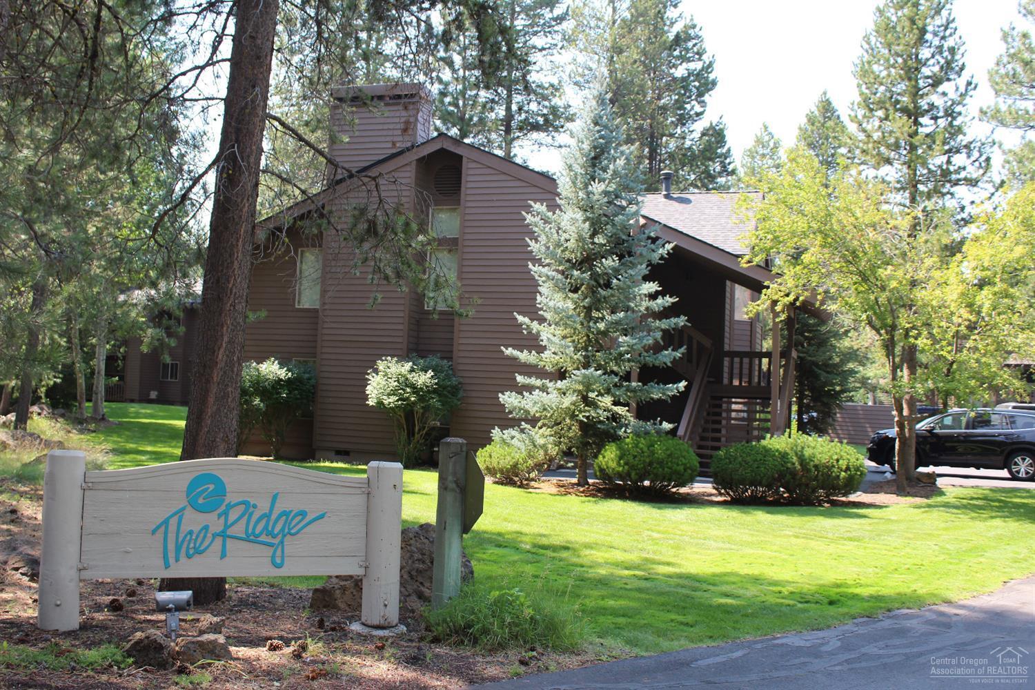 57340-17b2 Beaver Ridge Loop Sunriver, OR 97707 - Photo 16 of 16 a front view of a house with garden