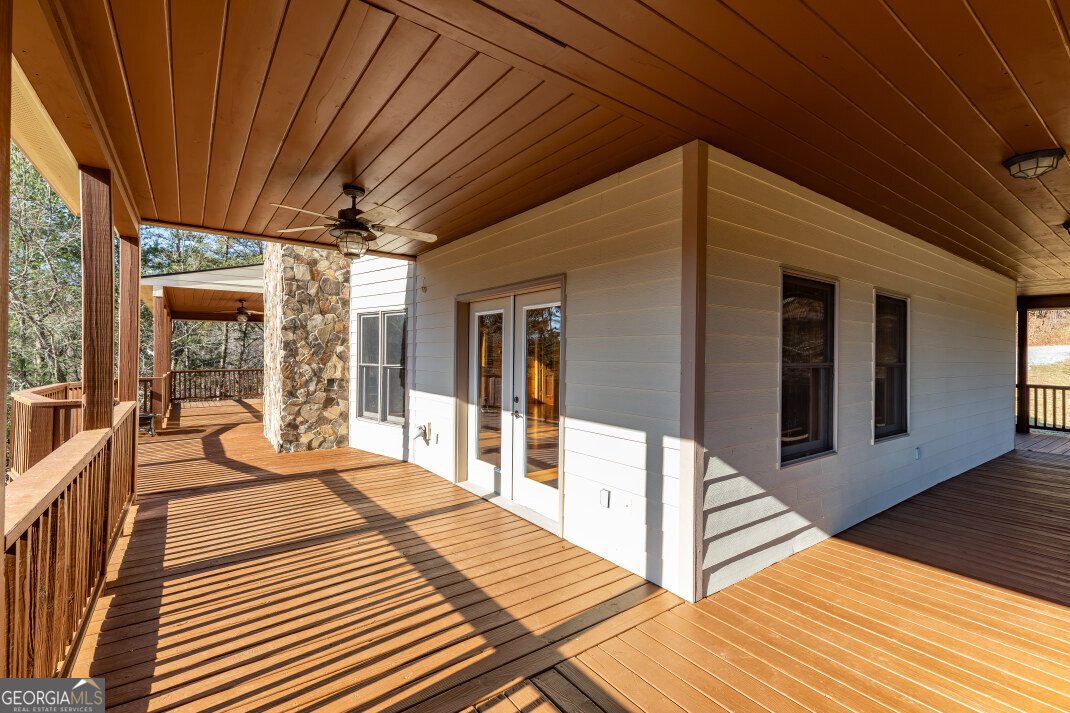 661 North Toccoa River Road Mineral Bluff, GA 30559 - Photo 35 of 68 a view of a balcony with wooden floor