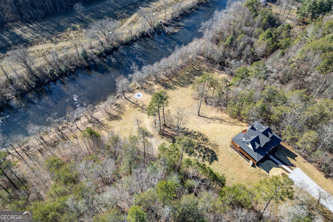 661 North Toccoa River Road Mineral Bluff, GA 30559 - Photo 54 of 68 a view of a yard with trees