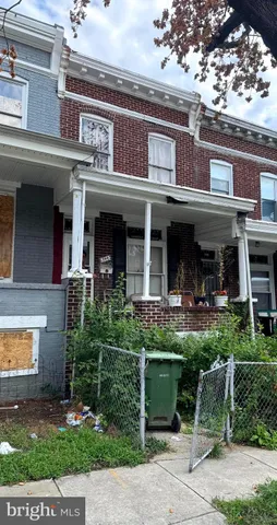 front view of a building with a yard