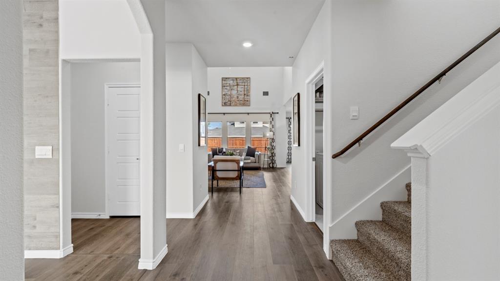 500 Range Road Caddo Mills, TX 75135 - Photo 25 of 35 Spacious hallway featuring wood-finish flooring, recessed lighting, and white baseboards