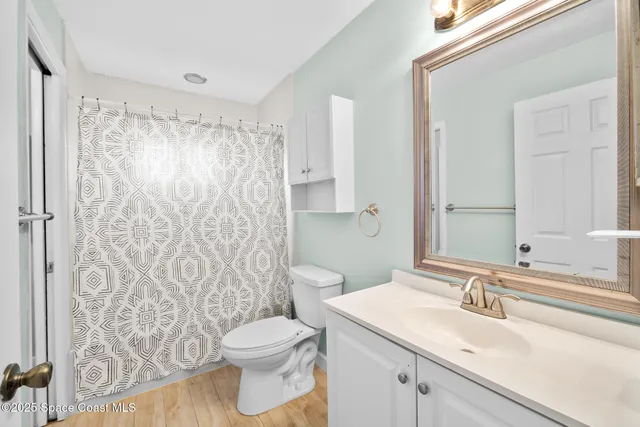 a view of a car parked in front of a building