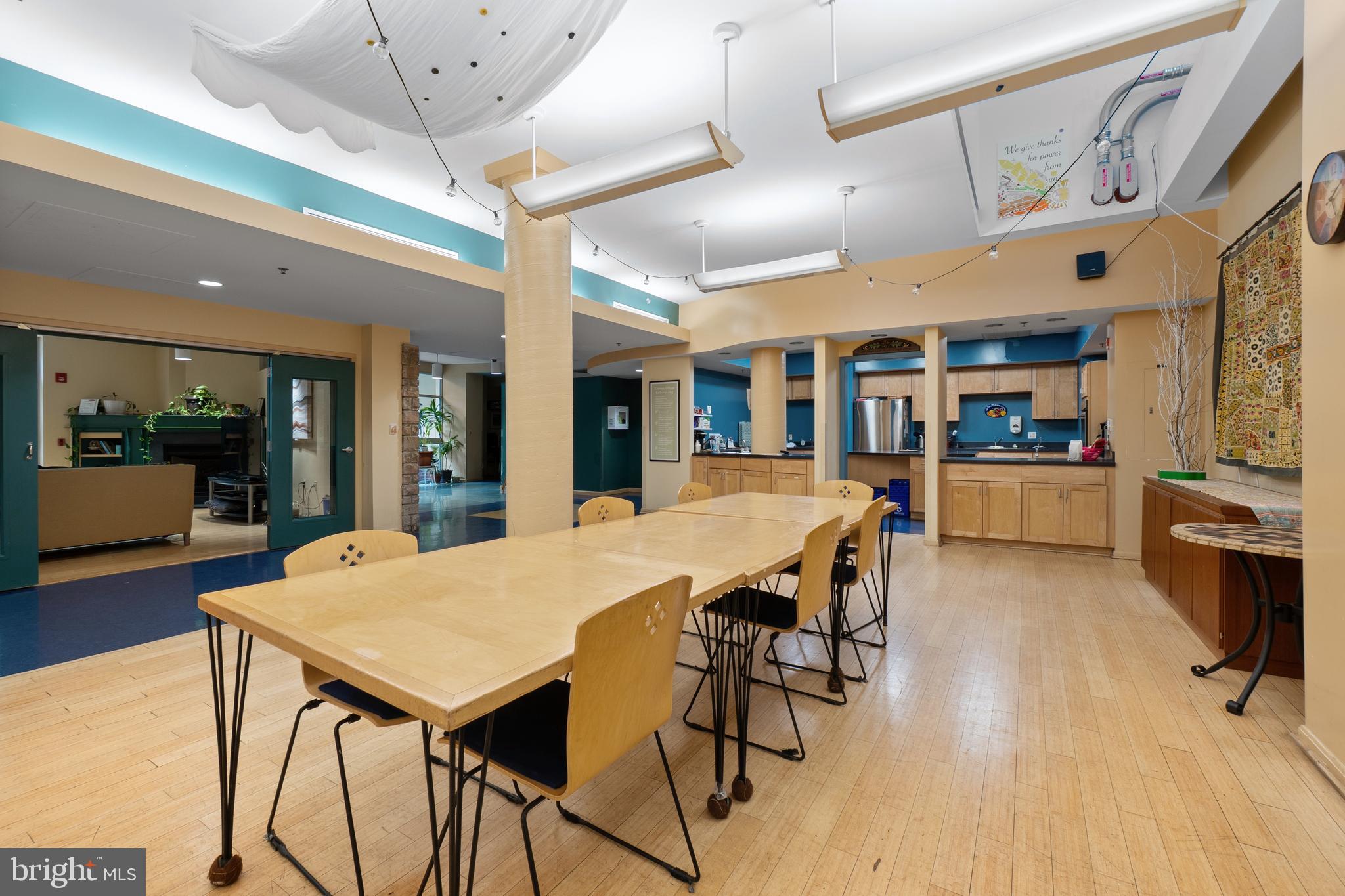 7981 Eastern Avenue Northwest, Unit 219 Silver Spring, MD 20910 - Photo 33 of 45 Common dining/flex space