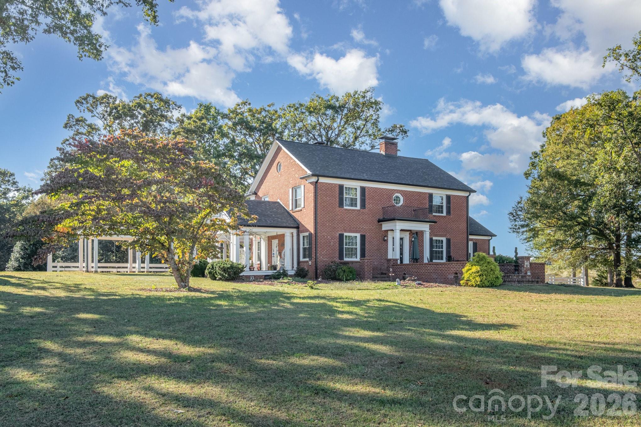 1783 Reepsville Road Lincolnton, NC 28092 - Photo 11 of 45 a front view of a house with a garden