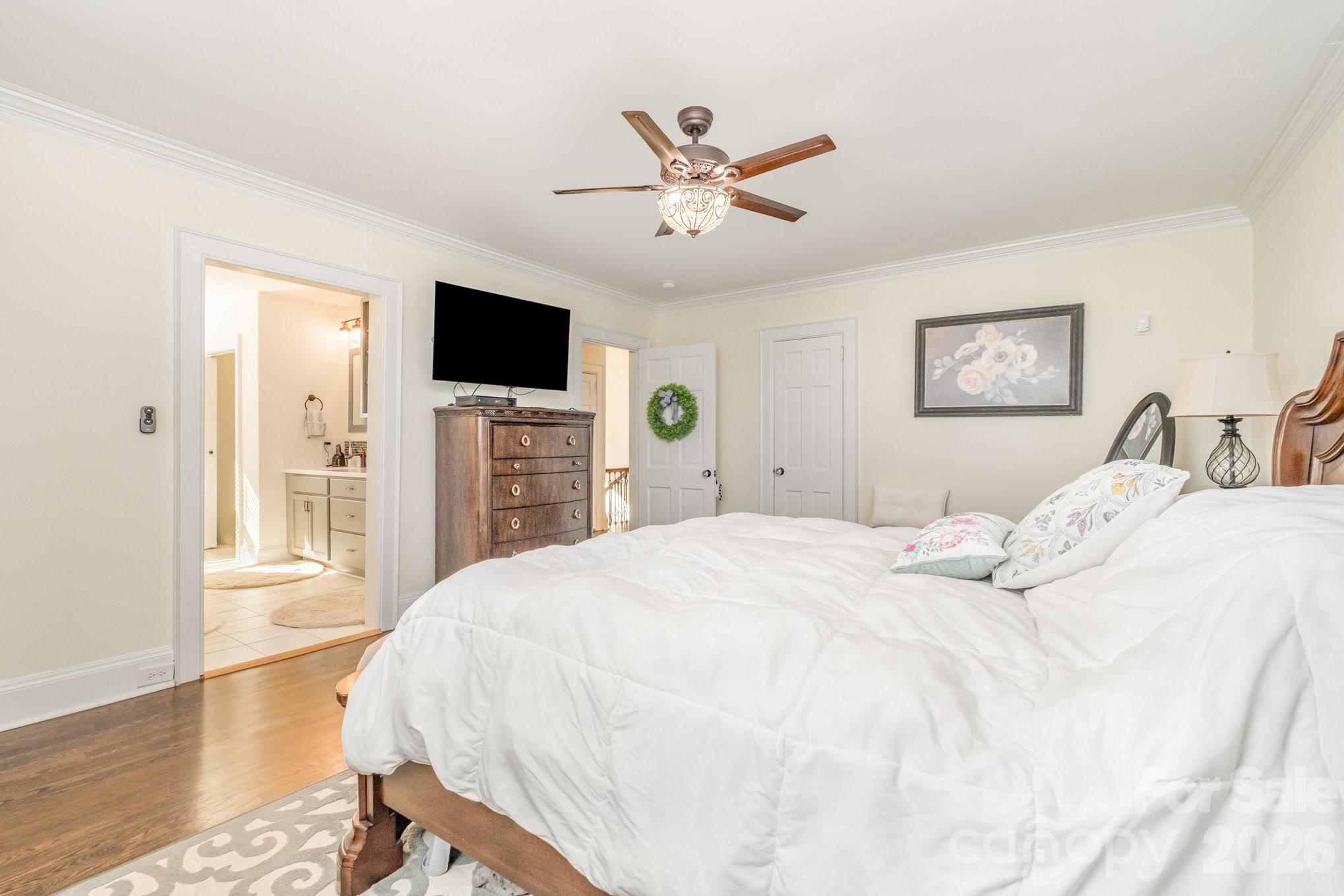 1783 Reepsville Road Lincolnton, NC 28092 - Photo 35 of 45 a bedroom with a bed and a flat screen tv