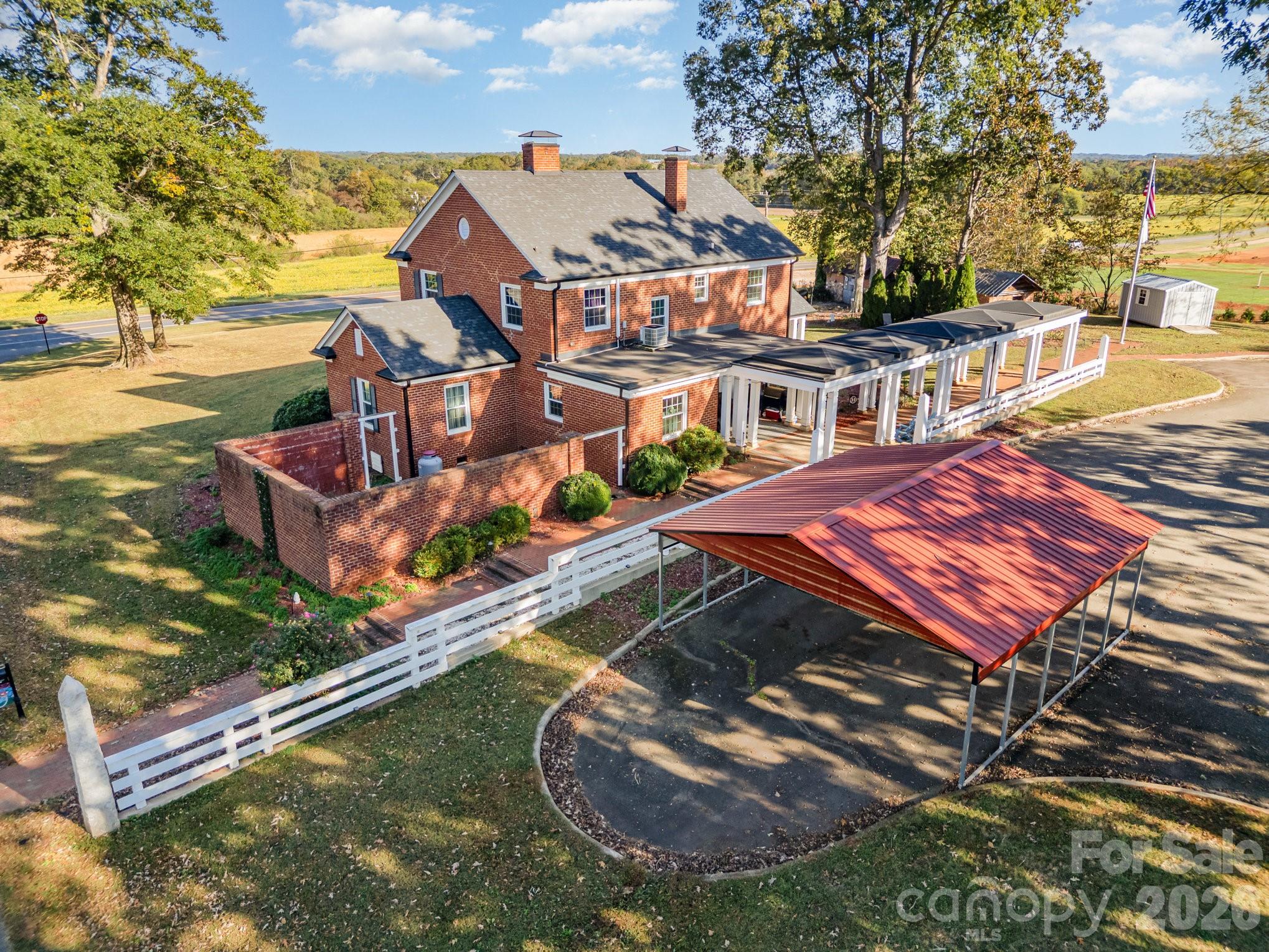 1783 Reepsville Road Lincolnton, NC 28092 - Photo 42 of 45 an aerial view of a house with a yard basket ball court and outdoor seating