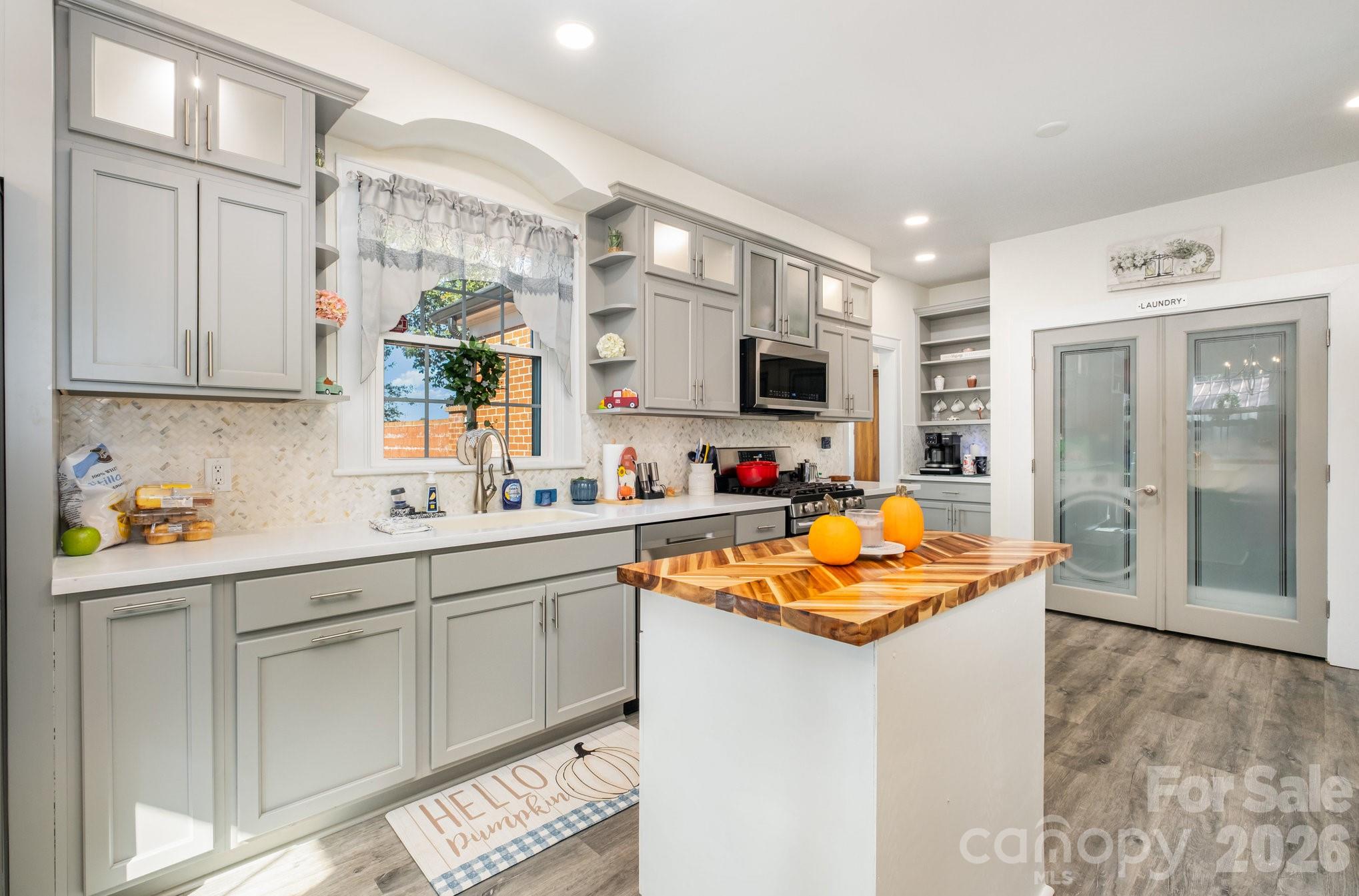 1783 Reepsville Road Lincolnton, NC 28092 - Photo 9 of 45 a kitchen with stainless steel appliances granite countertop a sink and cabinets